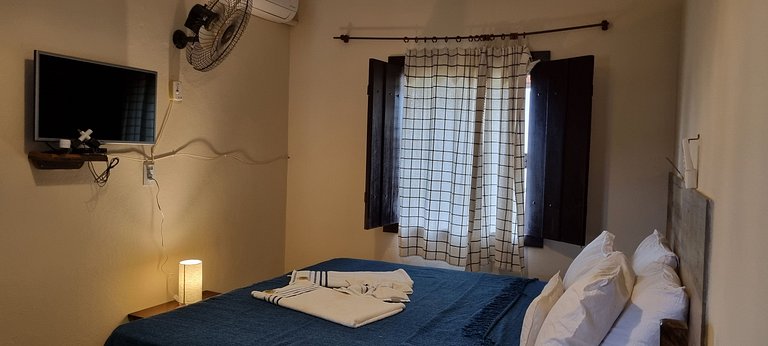Quádruplo Superior com Cama King e Ar-condicionado